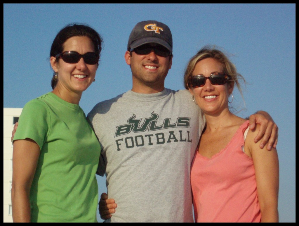 John Gunter with sisters at the beach