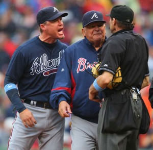 Chipper and Cox complete with manager in uniform. . . 