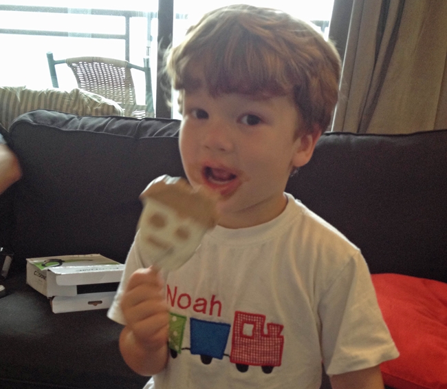Noah with his celebratory ice cream after surviving his first day of school